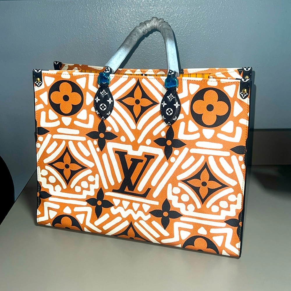 High end LV knock off. Brand new, never been used.
